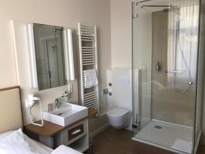 Koupelna v ubytování Stüttgens Hotel