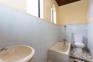 Ein Badezimmer in der Unterkunft Rumah Roda