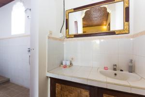 Ein Badezimmer in der Unterkunft Rumah Roda