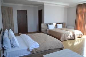 Hotel Skyline Batumi客房内的一张或多张床位
