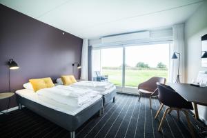 Letto o letti in una camera di Comwell Middelfart