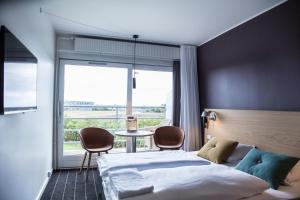 Letto o letti in una camera di Comwell Middelfart