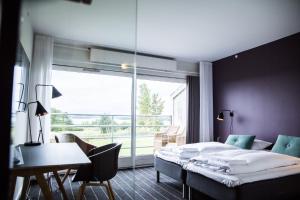 Letto o letti in una camera di Comwell Middelfart