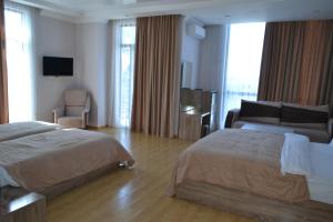 Hotel Skyline Batumi客房内的一张或多张床位