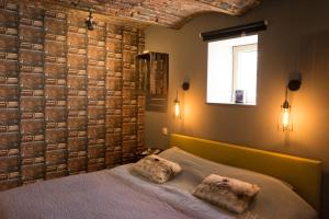Postel nebo postele na pokoji v ubytování Gîte de Corbion Loft1
