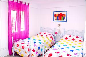 Posteľ alebo postele v izbe v ubytovaní Apartamento Del Rio Playa