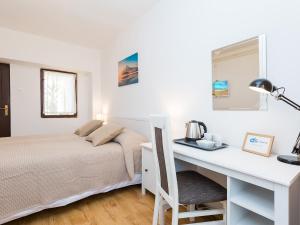 Postel nebo postele na pokoji v ubytování Villa Mira