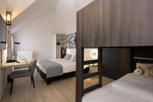 Voodi või voodid majutusasutuse Martin's Brugge toas
