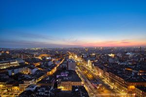 a view of a city at night at Haut Lofts - Toulouse Centre Ramblas in Toulouse