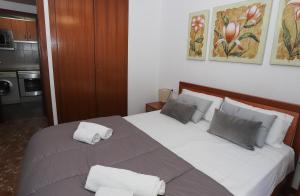 Posteľ alebo postele v izbe v ubytovaní DIFFERENTFLATS Casalmar