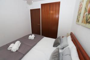 Posteľ alebo postele v izbe v ubytovaní DIFFERENTFLATS Casalmar