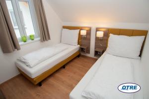 Posteľ alebo postele v izbe v ubytovaní Village Lipno Lakeside - Lipno 054