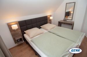 Posteľ alebo postele v izbe v ubytovaní Village Lipno Lakeside - Lipno 054