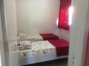 Ένα ή περισσότερα κρεβάτια σε δωμάτιο στο Apart Hotel Beira Mar +24 φωτογραφίες