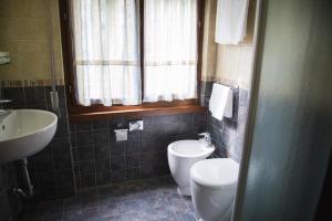 Kúpeľňa v ubytovaní Hotel Accursio