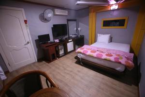 Postel nebo postele na pokoji v ubytování K Motel