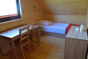 Łóżko lub łóżka w pokoju w obiekcie Klara