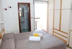 Postel nebo postele na pokoji v ubytování Hotel Caesar