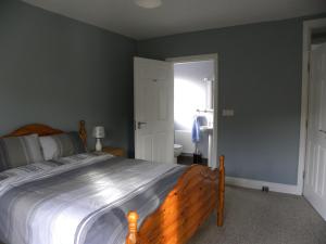 Postel nebo postele na pokoji v ubytování Orchard lodge Bantry