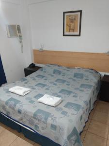 Posteľ alebo postele v izbe v ubytovaní Aires Express