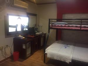 Postel nebo postele na pokoji v ubytování K Motel