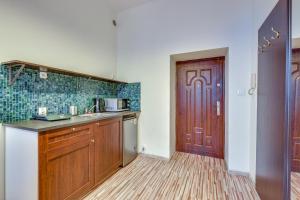 Kuchyň nebo kuchyňský kout v ubytování Apartamenty Mickiewicza - Superior Suites Katowice