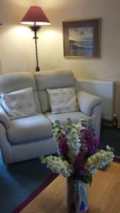 A seating area at South Sandpark Cottage
