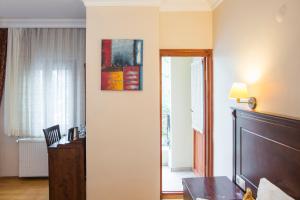 Postel nebo postele na pokoji v ubytování Berce Apartments