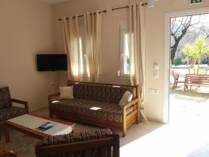 TV a/nebo společenská místnost v ubytování Dimitriou Rooms