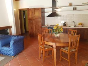 Kuchyň nebo kuchyňský kout v ubytování Poggio Cennina Resort