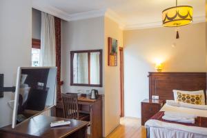 Postel nebo postele na pokoji v ubytování Berce Apartments