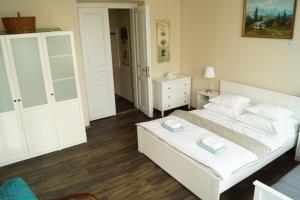 Postel nebo postele na pokoji v ubytování Apartmány Mary