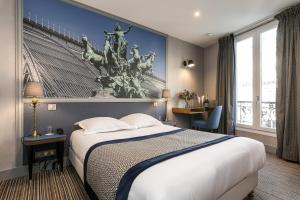 Ένα ή περισσότερα κρεβάτια σε δωμάτιο στο Hotel Saint Christophe +63 φωτογραφίες