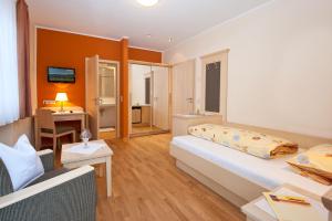 Postel nebo postele na pokoji v ubytování Wellness- und Wohlfühlhotel Waldeck