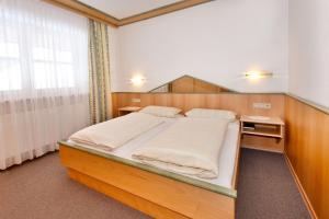 Postel nebo postele na pokoji v ubytování Wellness- und Wohlfühlhotel Waldeck