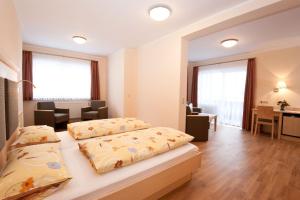 Postel nebo postele na pokoji v ubytování Wellness- und Wohlfühlhotel Waldeck