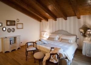 Postel nebo postele na pokoji v ubytování Klanjscek Wine&Stay