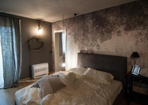 Postel nebo postele na pokoji v ubytování Klanjscek Wine&Stay