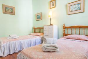 Säng eller sängar i ett rum på Vive la campiña Sevillana - Terraza y 3 Hab
