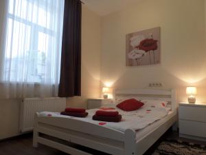 Postel nebo postele na pokoji v ubytování Happy Hotel