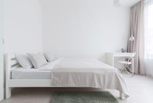 Postel nebo postele na pokoji v ubytování FREE PARKING in garage! New apartment in Karolina Plazza