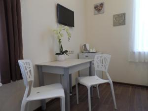 TV a/nebo společenská místnost v ubytování Happy Hotel