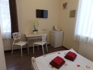 Postel nebo postele na pokoji v ubytování Happy Hotel