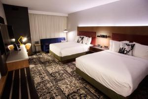Postel nebo postele na pokoji v ubytování Hotel Rock Lititz