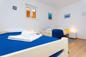 Posteľ alebo postele v izbe v ubytovaní Apartment Esperanza