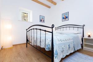 Posteľ alebo postele v izbe v ubytovaní Apartment Esperanza