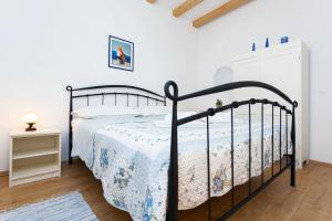 Posteľ alebo postele v izbe v ubytovaní Apartment Esperanza
