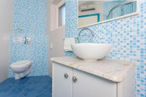 Kúpeľňa v ubytovaní Apartment Esperanza + 37 fotografií
