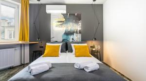 Posteľ alebo postele v izbe v ubytovaní Camera Apartments