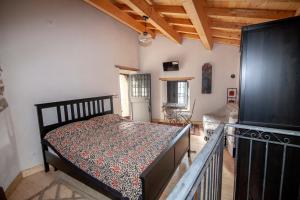 Giường trong phòng chung tại Casa Vacanza La Rocca